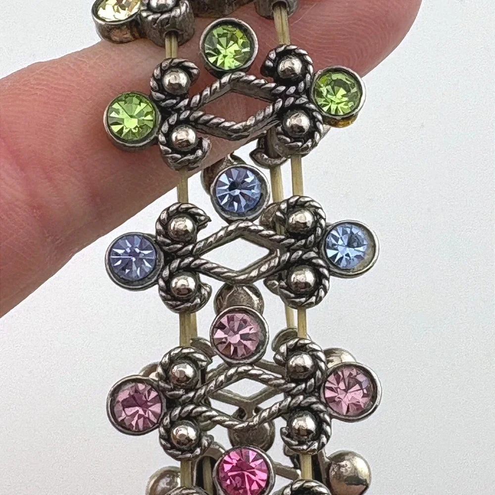 Joan Rivers intricate silver